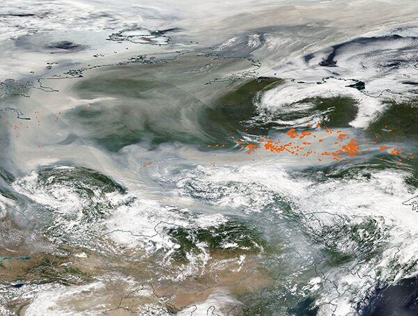 Foto gemaakt door NASA-Modis - Rook van de branden in Siberië vloog de afgelopen tijd alle kanten op, naar de Noordpool, maar ook Mongolië. 
