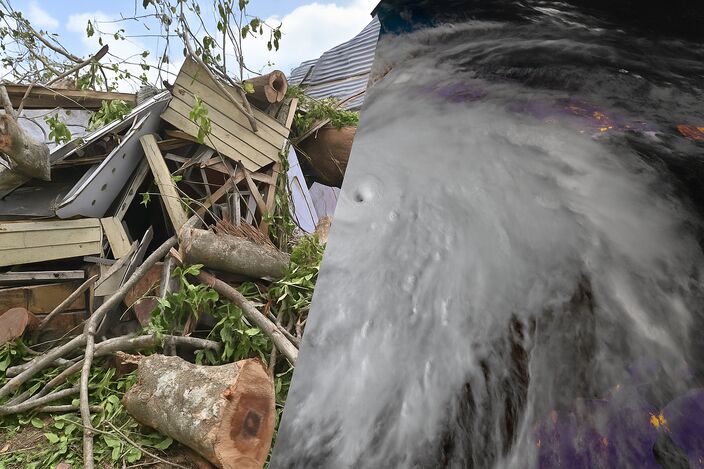 Foto gemaakt door Space.com - De tegenstelling tussen de verwoesting op land en het satellietbeeld van de orkaan zelf. Foto gemaakt door Space.com - De tegenstelling tussen de verwoesting op land en het satellietbeeld van de orkaan zelf.